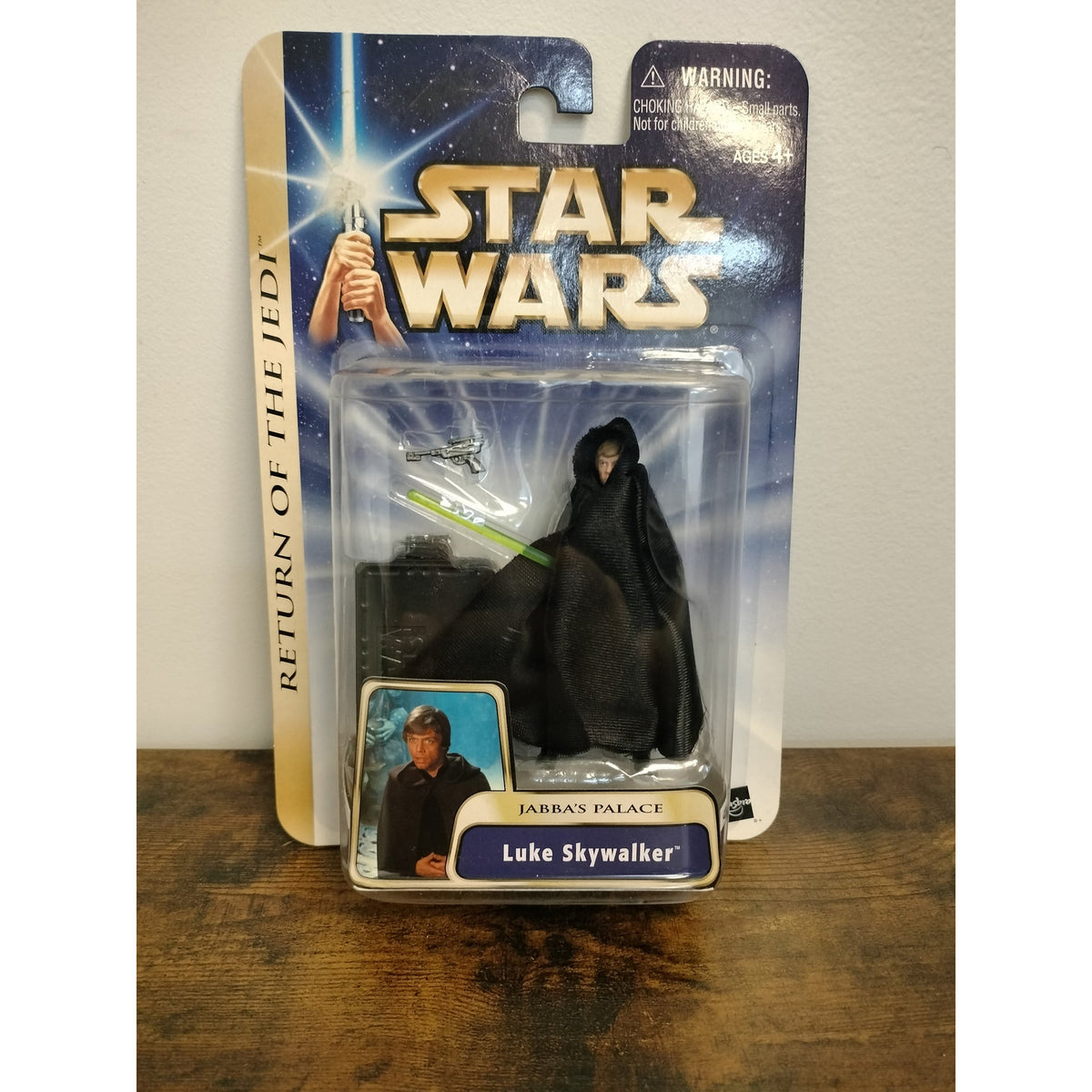 Actual item photographed: Hasbro Star Wars Saga 04/04 Luke Skywalker Jabba's Palace figure on original card, front view