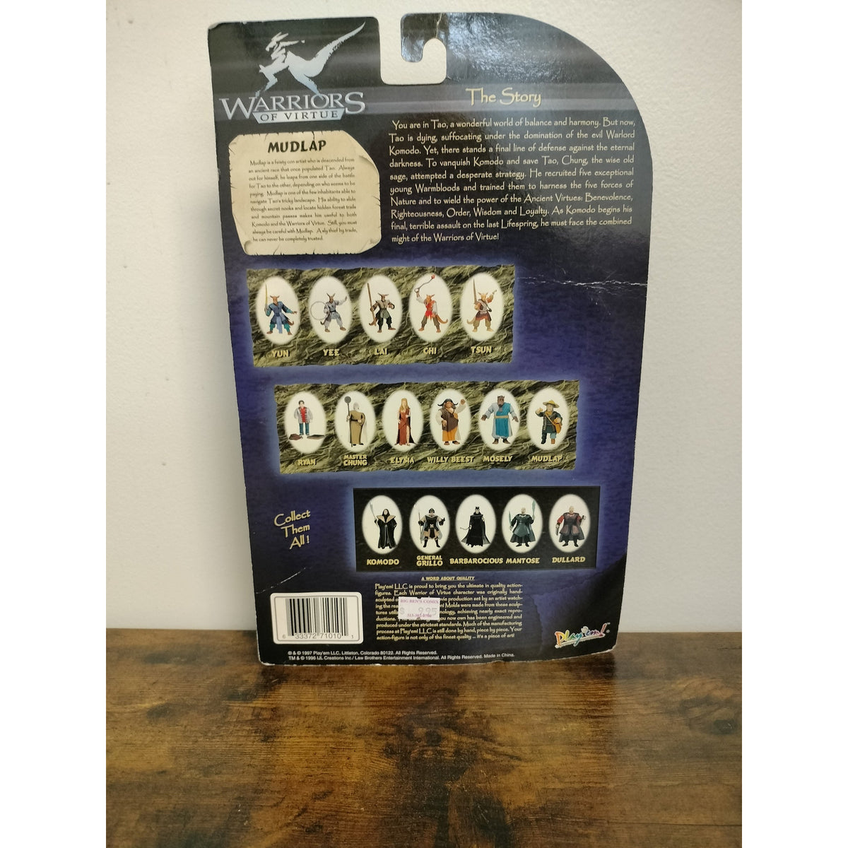 Actual item: rear of 1997 Play'em Warriors of Virtue Mudlap card showing character details and card creasing