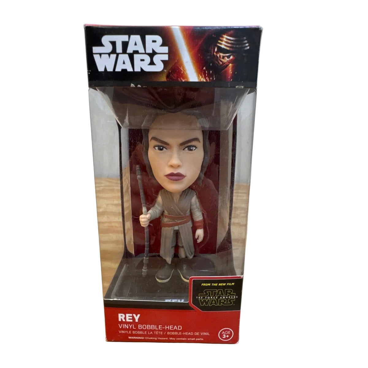 Funko Star Wars The Force Awakens Rey Wacky Wobbler bobblehead in window box, showing packaging condition