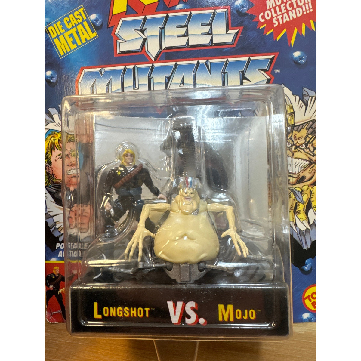 Longshot and Mojo die-cast figures close-up